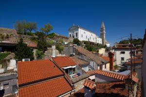 Little Tower With Terrace by Locap Group 