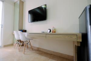 Cozy Studio Menteng Park Apartment By Travelio