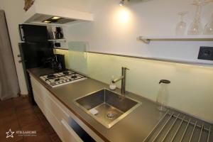 Appartements StellaHome - La petite cour : photos des chambres