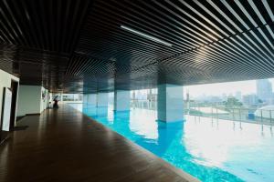 Modern Studio Menteng Park Apartment By Travelio