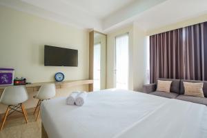 Modern Studio Menteng Park Apartment By Travelio