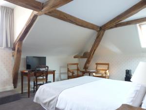 Hotels Hotel Grand Monarque : photos des chambres