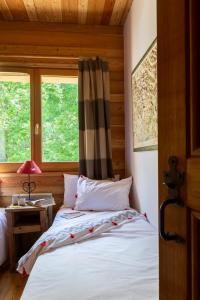 Appartements La Cabane de Serre-Chevalier, dans un esprit chalet, commune de Le Monetier-les-Bains : photos des chambres