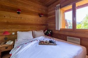 Appartements La Cabane de Serre-Chevalier, dans un esprit chalet, commune de Le Monetier-les-Bains : photos des chambres