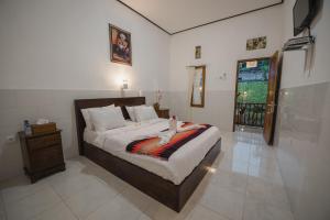 Phòng Deluxe Giường Đôi Có Ban Công (Deluxe Double Room with Balcony)