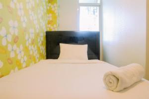 Vintage 2BR Apartment at Grand Kamala Lagoon By Travelio