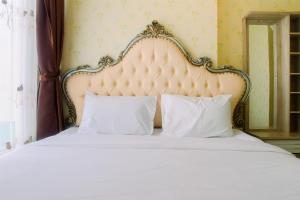 Vintage 2BR Apartment at Grand Kamala Lagoon By Travelio