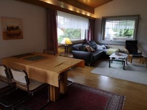Three-Bedroom Apartment with Balcony and Garden room in Chalet Sonnenblick