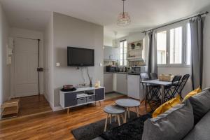 Appartements Charmant 2 pieces pour 4 personnes a Courbevoie : photos des chambres