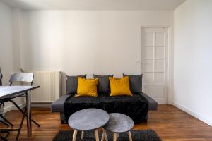 Appartements Charmant 2 pieces pour 4 personnes a Courbevoie : photos des chambres