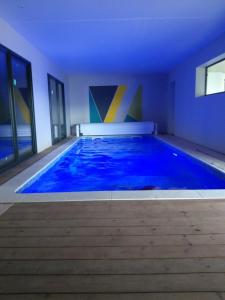 Maisons de vacances Maison avec Piscine interieure privee sans vis a vis chauffee toute l annee : photos des chambres