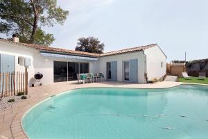 Villas Tres belle villa avec piscine (4*) : photos des chambres