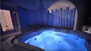 Junior Suite with private hot tub and Sea View room in AMOsuites & Spa