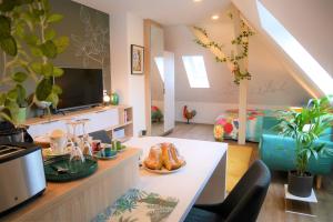 Appartements Le Jardin des Roses : photos des chambres