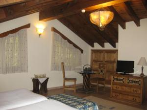 Family Suite with River View room in Hotel Rural Los Frutales