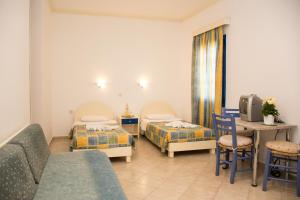 Studio (3 Adults) room in Uncle George Studios & Apartments by Checkin