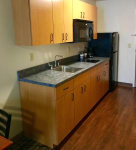 Queen Room with Two Queen Beds with Kitchenette room in Aspen Suites Hotel Kenai