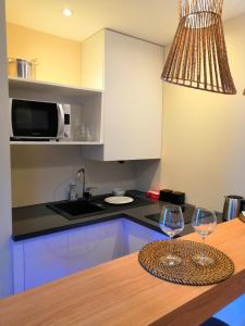 Appartements Studio Design Paloma Dark : photos des chambres