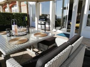 Appartements Appartement terrasse esprit loft vue sur mer : photos des chambres