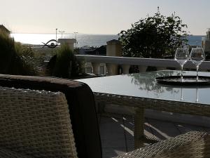 Appartements Appartement terrasse esprit loft vue sur mer : photos des chambres