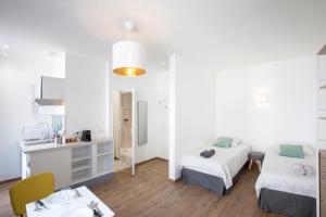 Appartements Le Pavillon Bleu : photos des chambres