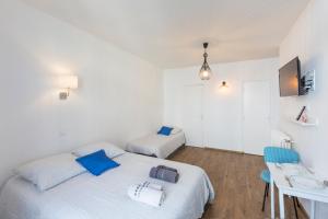 Appartements Le Pavillon Bleu : photos des chambres