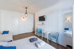 Appartements Le Pavillon Bleu : photos des chambres