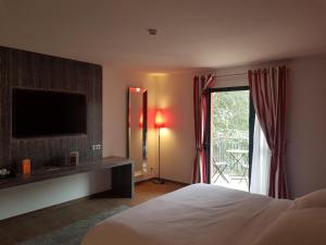 Hotels Les Maritonnes Parc & Vignoble : photos des chambres