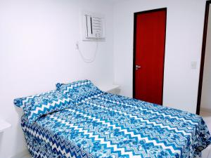 Confortável apartamento com piscina 300mt da praia