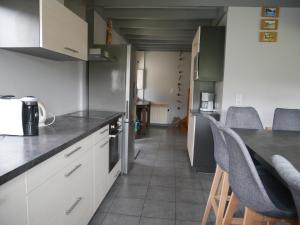 Chalets La jonquille jacuzzi et sauna : photos des chambres