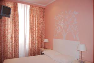 Double Room with Shared Bathroom room in Pensao Flor Da Baixa