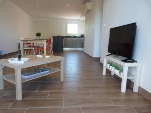 Maisons de vacances Les Lodges - Villa avec spa privatif : photos des chambres