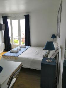 Appartements Escale Dieppe Gambetta - Appart et Studios 2-6 personnes Vue Ville et Mer : photos des chambres