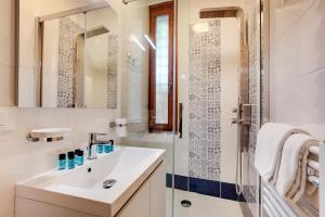 White Flowers with Canal View by Wonderful Italy