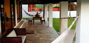 Casa de Gente Feliz Guarajuba - 6 suítes Pé na Areia