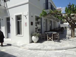 House in the grass land. Andros Greece