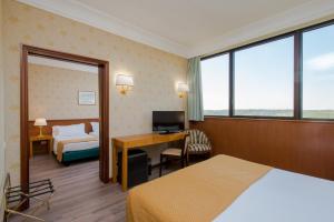 Standard Quadruple Room room in Hotel The Brand