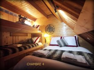 Chalets Cosy Lodge au pied de l'Alpe D'Huez Sport et Detente Jacuzzi Piscine Sauna Bar Billard : photos des chambres