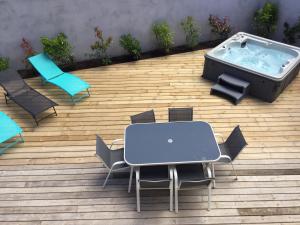 Maisons de vacances Appartement avec jacuzzi : photos des chambres