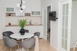 Explore the City from Its Center in a Chic Balcony Apartment