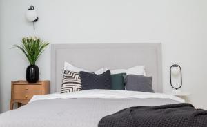 Explore the City from Its Center in a Chic Balcony Apartment