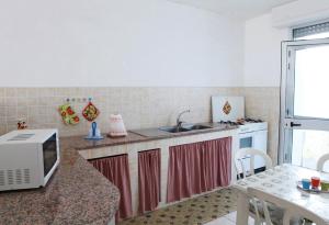 CASA FRONTE MARE POSTO ROSSO 8 POSTI LETTO