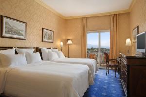 Superior Queen Room with Two Queen Beds, Balcony and Sea View - Low Floor room in RG NAXOS Hotel