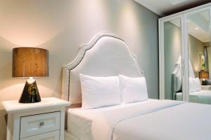 Elegant Studio Menteng Park Apartment By Travelio