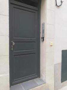 Appartements T2 Cozy proche des Halles Climatise : photos des chambres