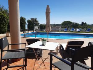Twin Room with Pool View room in Casa Rosa Montes