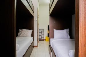 Best Price 2BR at Taman Melati Margonda Apartment By Travelio