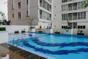 Best Price 2BR at Taman Melati Margonda Apartment By Travelio