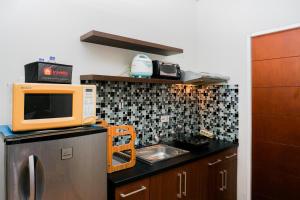 Best Price 2BR at Taman Melati Margonda Apartment By Travelio