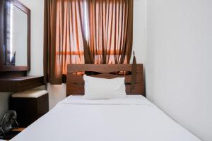 Best Price 2BR at Taman Melati Margonda Apartment By Travelio